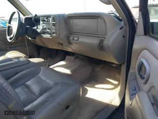 1997 Chevrolet Suburban with VIN 1GNFK16RXVJ439165, listed as a IAAI auction lot 41796768 with 131,020 mi miles. Bid and sale history available at carsss.com. Image 5.