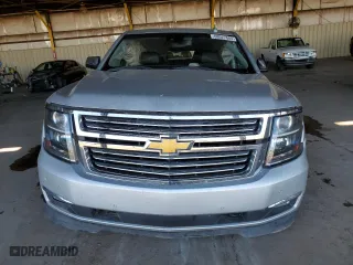 2018 Chevrolet Suburban Premier with VIN 1GNSCJKC7JR104888, listed as a Copart auction lot 68027604 with 69,632 mi miles and Salvage Title. Bid and sale history available at carsss.com. Image 5.