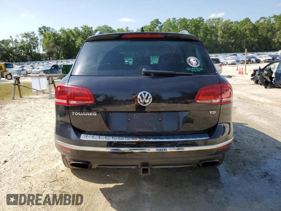 2015 Volkswagen Touareg Lux с VIN WVGEP9BP4FD004212, выставлен на аукционе Copart как лот 54021345 с пробегом 156 164 миль миль и Списание • Salvage title. История ставок и продаж доступна на DreamBid. Изображение 6.