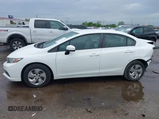 2014 Honda Civic LX z VIN 19XFB2F52EE211993, wystawiony jako IAAI lot #41895675 z przebiegiem 90 857 mil mil oraz . Historia ofert i sprzedaży dostępna na DreamBid. Obrazek 15.