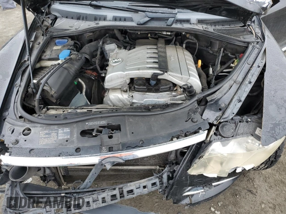 2008 Volkswagen Touareg V6 z VIN WVGLE77L28D026719, wystawiony jako Copart lot #48539225 z przebiegiem Nie podano mil oraz Szkoda całkowita • Salvage title. Historia ofert i sprzedaży dostępna na DreamBid. Obrazek 12.