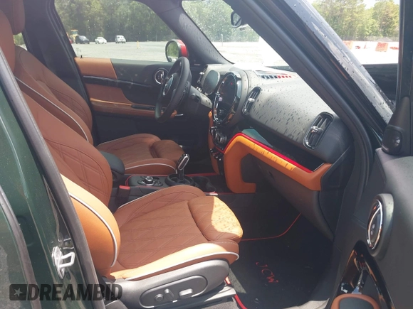 2023 MINI Countryman John Cooper Works z VIN WMZ33BS09P3R00627, wystawiony jako IAAI lot #42419212 z przebiegiem 12 260 mil mil oraz . Historia ofert i sprzedaży dostępna na DreamBid. Obrazek 5.