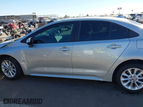 2022 Toyota Corolla LE with VIN 5YFVPMAE8NP312132, listed as a IAAI auction lot 41671016 with 34,598 mi miles. Bid and sale history available at carsss.com. Image 14.