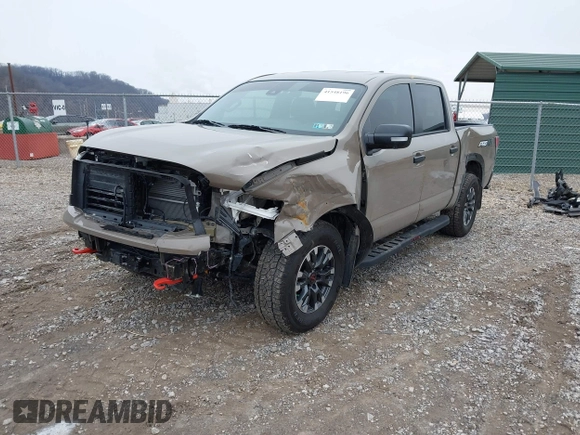 2024 Nissan Titan Pro-4X z VIN 1N6AA1ED0RN114614, wystawiony jako IAAI lot #41548196 z przebiegiem 3 405 mil mil oraz . Historia ofert i sprzedaży dostępna na DreamBid. Obrazek 2.