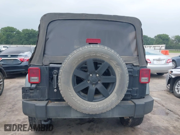 2014 Jeep Wrangler Unlimited Sport with VIN 1C4BJWDG0EL290441, listed as a IAAI auction lot 42204434 with 138,367 mi miles and . Bid and sale history available at DreamBid. Image 16.