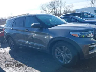 2021 Ford Explorer XLT with VIN 1FMSK8DH1MGA14273, listed as a IAAI auction lot 41934273 with 59,468 mi miles. Bid and sale history available at carsss.com. Image 13.