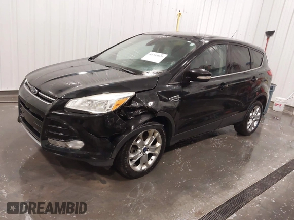 2013 Ford Escape SEL with VIN 1FMCU9H99DUD11347, listed as a IAAI auction lot 41758824 with 154,339 mi miles. Bid and sale history available at carsss.com. Image 17.