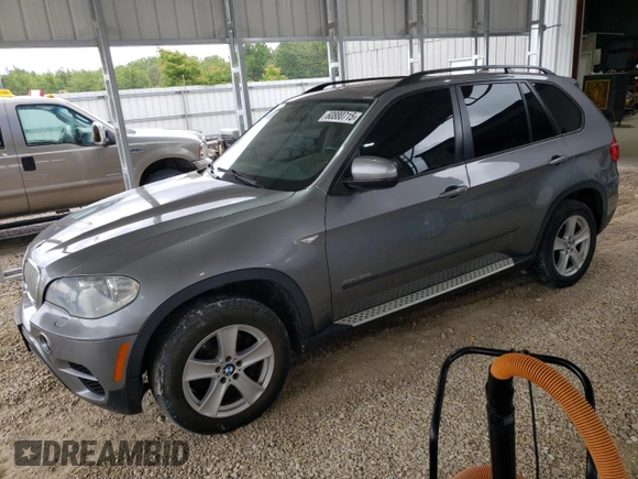2012 BMW X5 35d with VIN 5UXZW0C53CL671564, listed as a Copart auction lot 60880715 with 154,401 mi miles and Clean title. Bid and sale history available at DreamBid. Image 1.