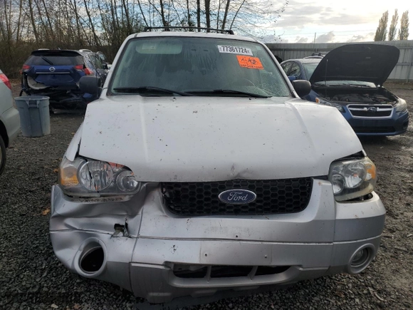 2005 Ford Escape Hybrid with VIN 1FMCU95H95KC74177, listed as a Copart auction lot 77361724 with 195,199 mi miles and Salvage Title. Bid and sale history available at carsss.com. Image 5.