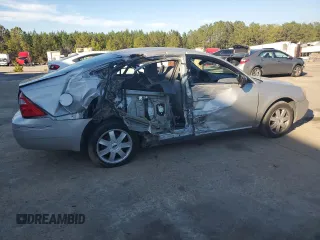2006 Ford Five Hundred SE с VIN 1FAFP23146G157297, выставлен на аукционе Copart как лот 46508745 с пробегом 91 021 миль миль и Списание • Salvage title. История ставок и продаж доступна на DreamBid. Изображение 3.