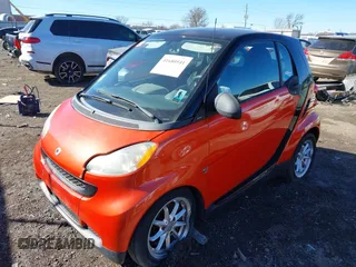 2008 Smart fortwo Pure z VIN WMEEJ31X28K122571, wystawiony jako IAAI lot #41680541 z przebiegiem 63 673 mil mil oraz . Historia ofert i sprzedaży dostępna na DreamBid. Obrazek 17.
