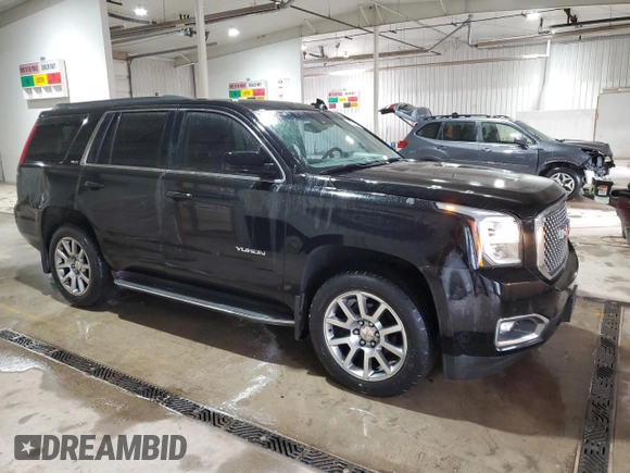 2015 GMC Yukon SLE with VIN 1GKS2AKC3FR664740, listed as a Copart auction lot 53824145 with 194,655 mi miles and Salvage Title. Bid and sale history available at carsss.com. Image 4.