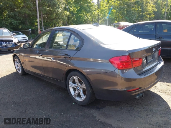 2014 BMW 3 Series 328i xDrive with VIN WBA3B5C53EP543978, listed as a IAAI auction lot 42538498 with 194,826 mi miles and . Bid and sale history available at DreamBid. Image 3.