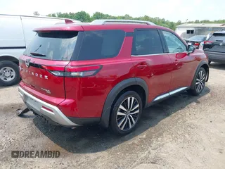 2023 Nissan Pathfinder Platinum with VIN 5N1DR3DJXPC234002, listed as a IAAI auction lot 42480807 with 21,477 mi miles and . Bid and sale history available at DreamBid. Image 4.
