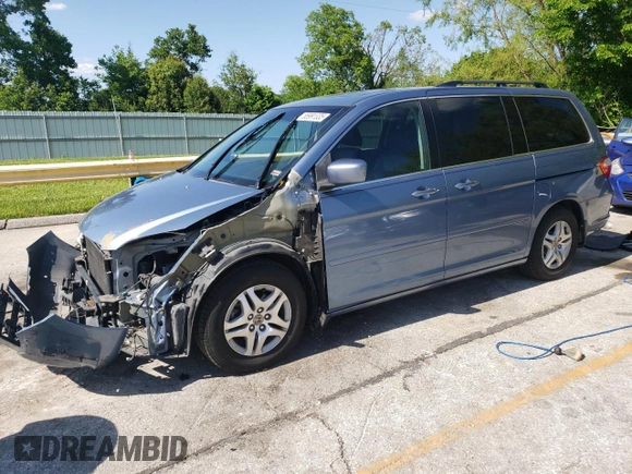 2006 Honda Odyssey Touring z VIN 5FNRL388X6B009356, wystawiony jako Copart lot #55991335 z przebiegiem 101 816 mil mil oraz Szkoda całkowita • Salvage title. Historia ofert i sprzedaży dostępna na DreamBid. Obrazek 1.