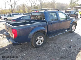 2006 Nissan Frontier LE with VIN 1N6AD07U26C469189, listed as a IAAI auction lot 41780595 with 146,000 mi miles. Bid and sale history available at carsss.com. Image 4.