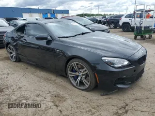 2015 BMW M6 z VIN WBSLX9C57FD160701, wystawiony jako Copart lot #57118924 z przebiegiem 60 271 mil mil oraz Tytuł czysty. Historia ofert i sprzedaży dostępna na DreamBid. Obrazek 4.