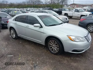 2011 Chrysler 200 Touring with VIN 1C3BC1FB3BN551046, listed as a IAAI auction lot 41823700 with 223,447 mi miles. Bid and sale history available at carsss.com. Image 1.
