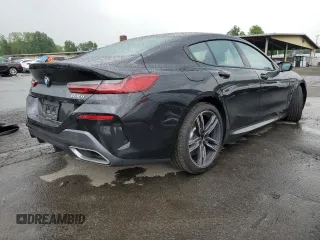 2022 BMW 8 Series 840i with VIN WBAGV4C04NCJ54569, listed as a Copart auction lot 61818223 with 23,680 mi miles. Bid and sale history available at carsss.com. Image 3.