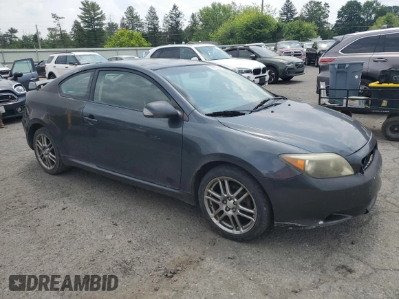 2006 Scion tC z VIN JTKDE177X60123771, wystawiony jako Copart lot #59763245 z przebiegiem 231 959 mil mil oraz Szkoda całkowita • Salvage title. Historia ofert i sprzedaży dostępna na DreamBid. Obrazek 4.