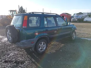 2000 Honda CR-V EX with VIN JHLRD1864YC025085, listed as a IAAI auction lot 41610450 with 249,573 mi miles. Bid and sale history available at carsss.com. Image 4.