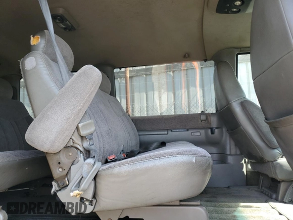 1998 GMC Safari z VIN 1GKDM19W1WB512631, wystawiony jako Copart lot #75899764 z przebiegiem 207 067 mil mil oraz Szkoda całkowita • Salvage title. Historia ofert i sprzedaży dostępna na DreamBid. Obrazek 11.