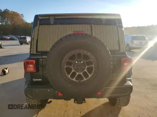 2022 Jeep Wrangler Unlimited High Tide with VIN 1C4HJXDG0NW247152, listed as a Copart auction lot 82371674 with 32,417 mi miles and Salvage Title. Bid and sale history available at DreamBid. Image 6.