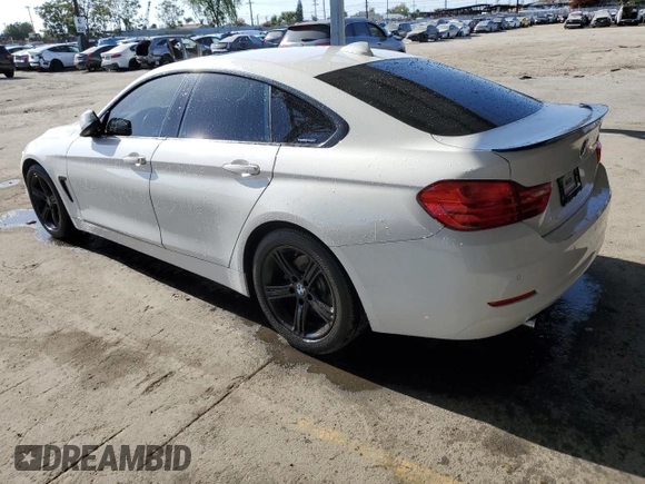 2015 BMW 4 Series 428i with VIN WBA4A9C5XFGL85882, listed as a Copart auction lot 57434445 with 145,765 mi miles and Salvage title. Bid and sale history available at DreamBid. Image 2.