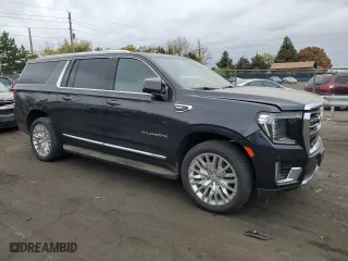 2024 GMC Yukon XL SLT with VIN 1GKS2GKD5RR224566, listed as a Copart auction lot 76997694 with 15,917 mi miles and Salvage Title. Bid and sale history available at carsss.com. Image 4.