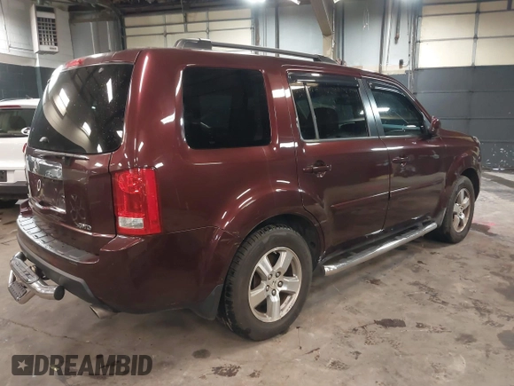 2009 Honda Pilot EX-L with VIN 5FNYF48569B021586, listed as a IAAI auction lot 41609721 with 291,598 mi miles. Bid and sale history available at carsss.com. Image 4.