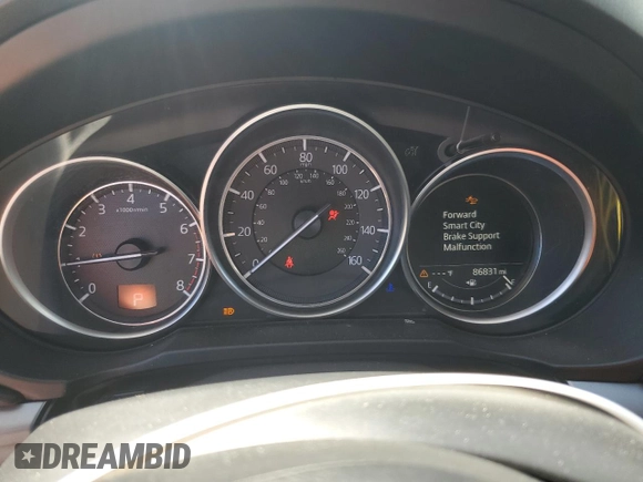 2018 Mazda CX-5 Touring z VIN JM3KFBCM2J1363310, wystawiony jako Copart lot #58969135 z przebiegiem 86 831 mil mil oraz Szkoda całkowita • Salvage title. Historia ofert i sprzedaży dostępna na DreamBid. Obrazek 9.