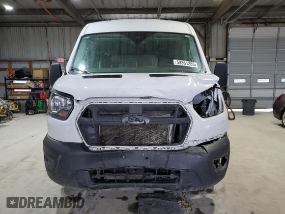 2023 Ford Transit Cargo z VIN 1FTBR1C86PKB96319, wystawiony jako Copart lot #59361285 z przebiegiem 34 823 mil mil oraz Szkoda całkowita • Salvage title. Historia ofert i sprzedaży dostępna na DreamBid. Obrazek 5.