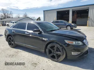 2011 Ford Taurus SHO with VIN 1FAHP2KT0BG142303, listed as a Copart auction lot 48076275 with 217,980 mi miles and Salvage Title. Bid and sale history available at DreamBid. Image 4.
