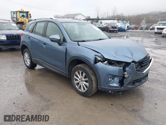 2016 Mazda CX-5 Sport with VIN JM3KE4BY5G0727608, listed as a IAAI auction lot 41975279 with 95,817 mi miles and . Bid and sale history available at carsss.com. Image 1.