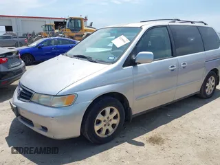 2003 Honda Odyssey EX z VIN 5FNRL18633B036686, wystawiony jako IAAI lot #42290906 z przebiegiem 201 773 mil mil oraz . Historia ofert i sprzedaży dostępna na DreamBid. Obrazek 2.