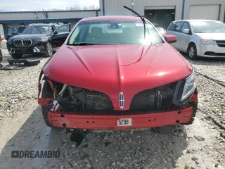 2014 Lincoln MKS EcoBoost z VIN 1LNHL9FT3EG610310, wystawiony jako Copart lot #53856455 z przebiegiem 165 760 mil mil oraz Czysty tytuł • Clean title. Historia ofert i sprzedaży dostępna na DreamBid. Obrazek 5.