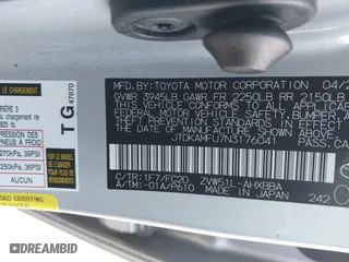 2022 Toyota Prius L Eco with VIN JTDKAMFU7N3176041, listed as a IAAI auction lot 41562977 with 61,964 mi miles. Bid and sale history available at carsss.com. Image 9.