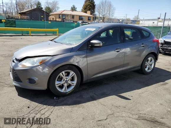 2014 Ford Focus SE with VIN 1FADP3K26EL293900, listed as a Copart auction lot 52888495 with 123,709 mi miles and Salvage Title. Bid and sale history available at carsss.com. Image 1.