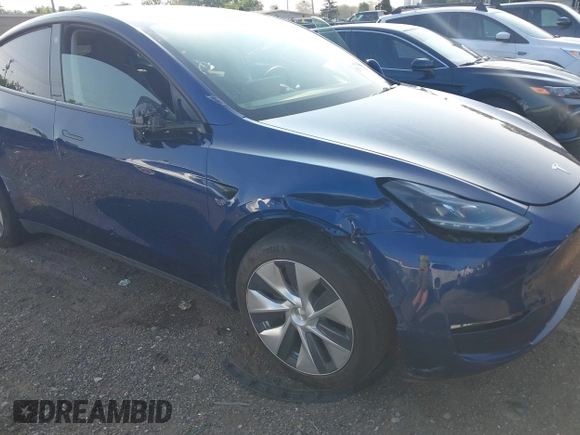 2023 Tesla Model Y Long Range with VIN 7SAYGDEE0PF671726, listed as a IAAI auction lot 42393616 with Not provided miles and . Bid and sale history available at DreamBid. Image 6.