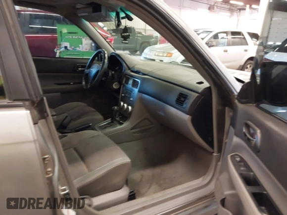 2007 Subaru Forester X w/Premium Pkg with VIN JF1SG65657H719525, listed as a IAAI auction lot 41696437 with 217,895 mi miles. Bid and sale history available at carsss.com. Image 5.