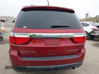 2013 Dodge Durango Citadel with VIN 1C4RDJEGXDC669937, listed as a IAAI auction lot 42105204 with 153,015 mi miles and . Bid and sale history available at DreamBid. Image 16.