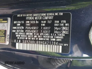 2017 Hyundai Santa Fe 2.4L z VIN 5XYZUDLB9HG421284, wystawiony jako IAAI lot #42441436 z przebiegiem 96 155 mil mil oraz . Historia ofert i sprzedaży dostępna na DreamBid. Obrazek 9.