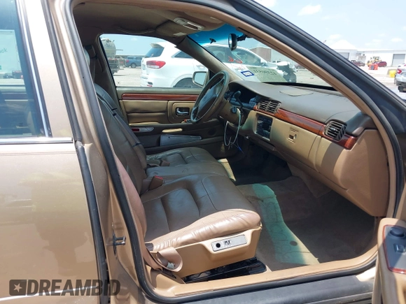 1999 Cadillac DeVille z VIN 1G6KD54Y2XU788781, wystawiony jako IAAI lot #42390531 z przebiegiem 180 328 mil mil oraz . Historia ofert i sprzedaży dostępna na DreamBid. Obrazek 5.