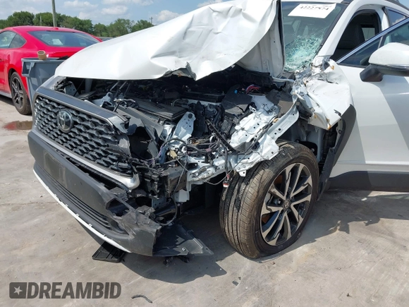 2024 Toyota Corolla Cross XLE with VIN 7MUDAAAG5RV097731, listed as a IAAI auction lot 42227874 with 9,151 mi miles and . Bid and sale history available at DreamBid. Image 6.