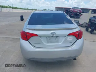 2017 Toyota Corolla L z VIN 5YFBURHE4HP732912, wystawiony jako IAAI lot #42451597 z przebiegiem 73 901 mil mil oraz . Historia ofert i sprzedaży dostępna na DreamBid. Obrazek 16.