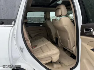 2014 Jeep Grand Cherokee Overland with VIN 1C4RJFCM1EC298621, listed as a Copart auction lot 54796775 with 142,491 mi miles and Clean Title. Bid and sale history available at carsss.com. Image 6.