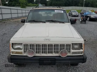 1996 Jeep Cherokee Sport z VIN 1J4FJ68S3TL103684, wystawiony jako Copart lot #63466265 z przebiegiem 163 715 mil mil oraz Czysty tytuł • Clean title. Historia ofert i sprzedaży dostępna na DreamBid. Obrazek 5.