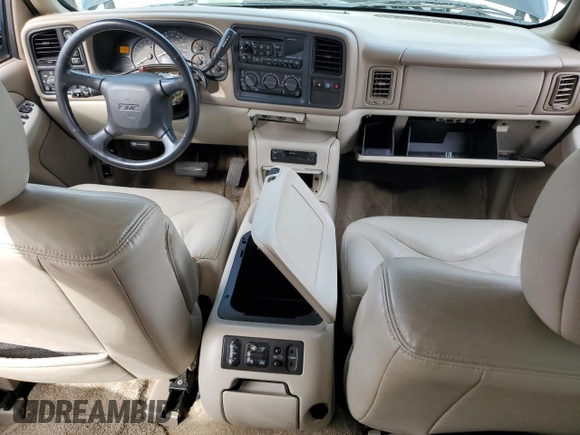 2002 GMC Yukon SLT z VIN 1GKEK13Z52J184367, wystawiony jako Copart lot #75938904 z przebiegiem 119 717 mil mil oraz Szkoda całkowita • Salvage title. Historia ofert i sprzedaży dostępna na DreamBid. Obrazek 8.