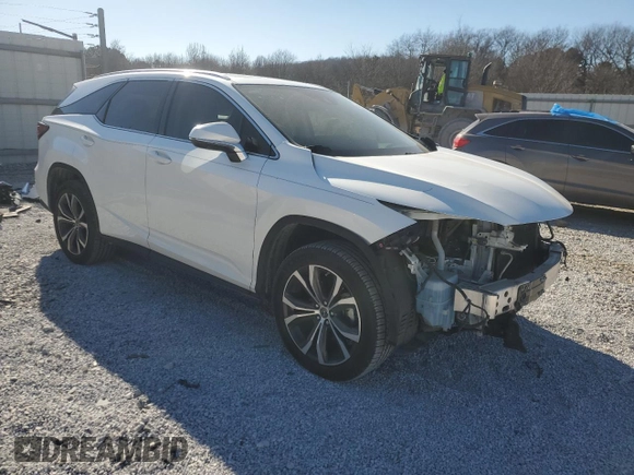 2021 Lexus RX with VIN JTJHZKFA5M2030137, listed as a Copart auction lot 42520195 with 79,355 mi miles and Salvage Title. Bid and sale history available at carsss.com. Image 4.