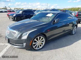 2016 Cadillac ATS Coupe Luxury Collection AWD with VIN 1G6AH1RX6G0109787, listed as a IAAI auction lot 41151839 with 71,573 mi miles. Bid and sale history available at carsss.com. Image 2.